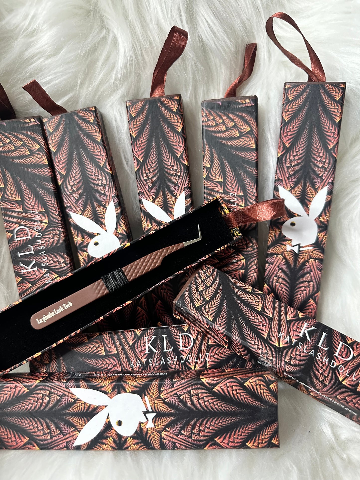 Millionaire vibes playboy bunny tweezers