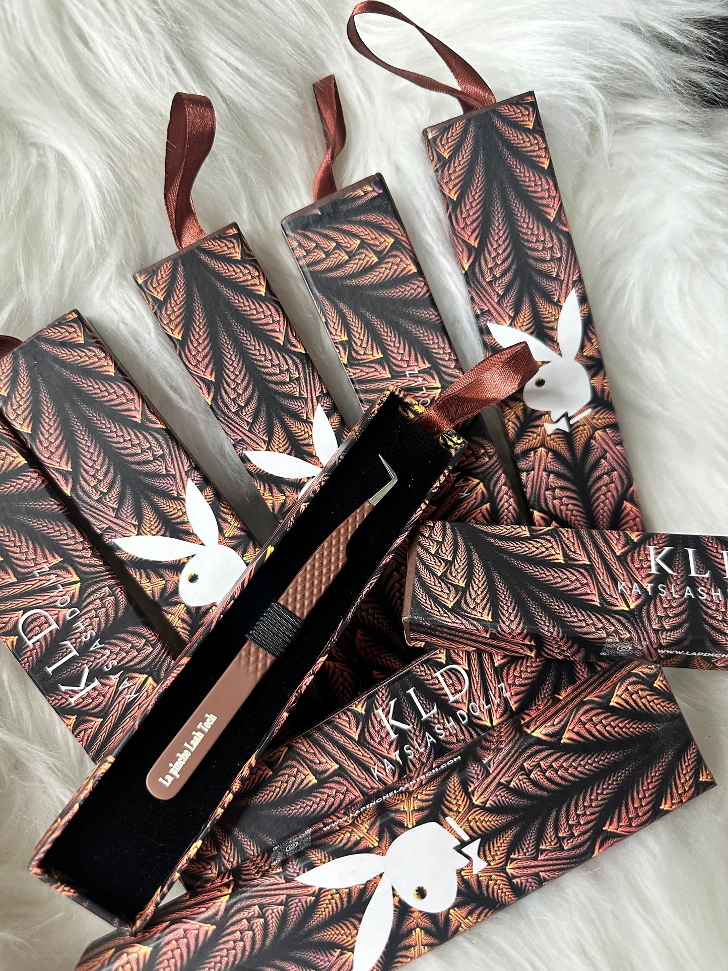 Millionaire vibes playboy bunny tweezers